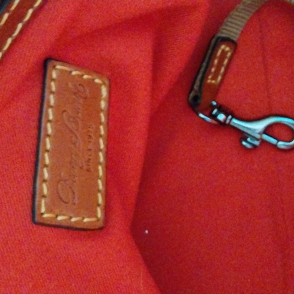 Dooney & Bourke medium satchel. Canvas w/leather trim. Key keeper. Used once. - Picture 6 of 6